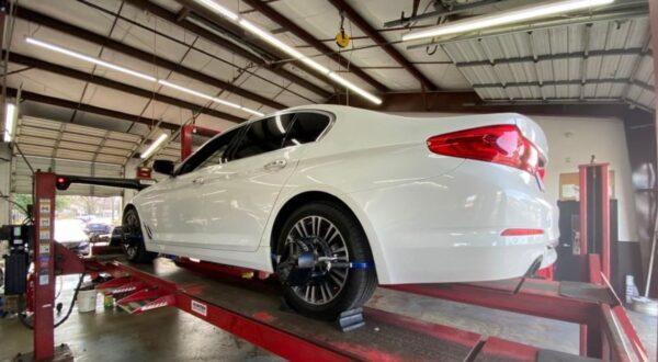 a white car looking to get alignment work