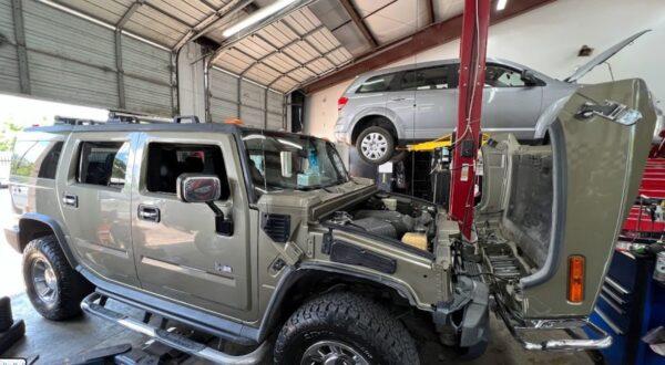 a humvee getting some technical work done under the hood
